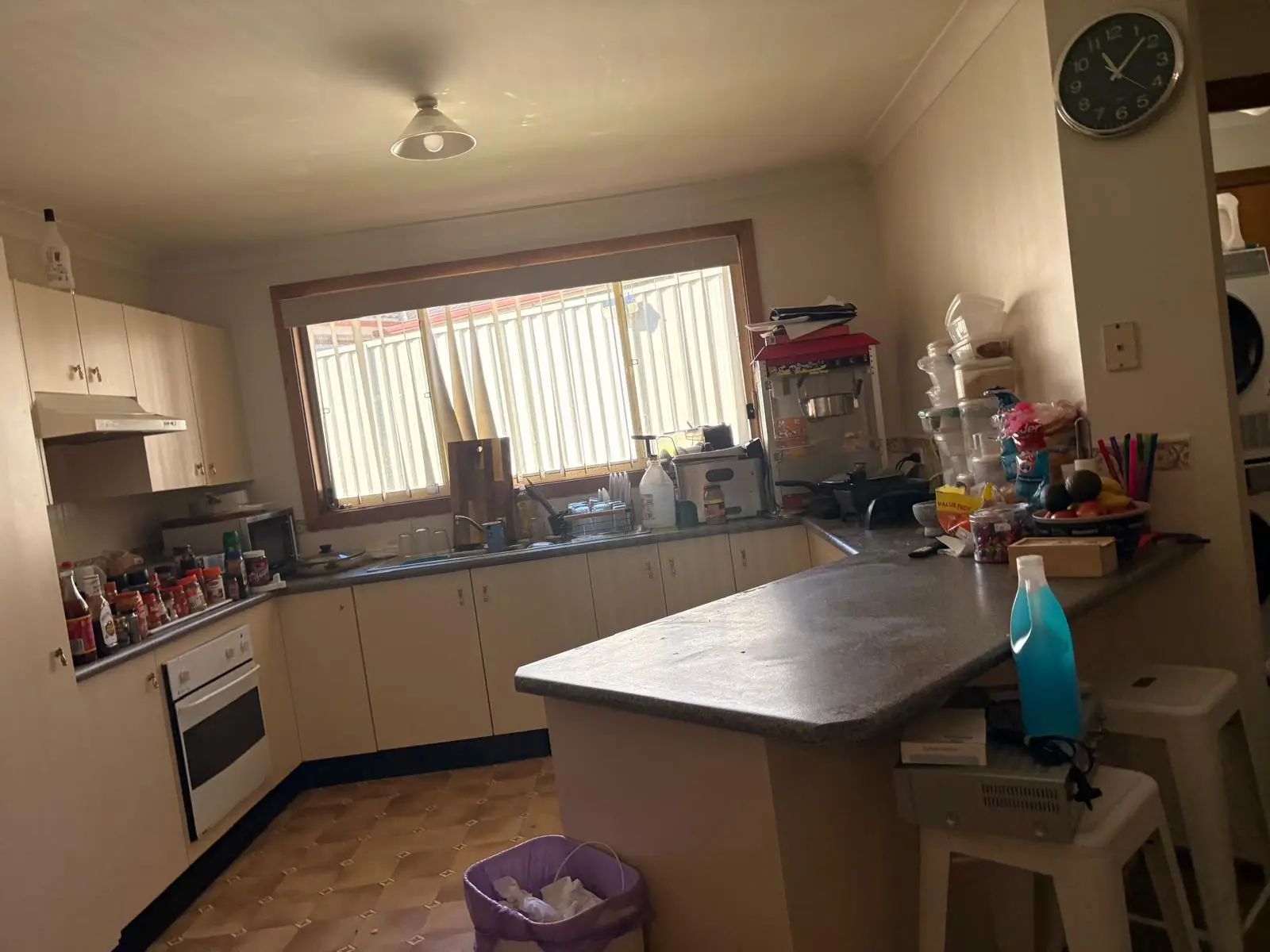 Tired long-term rental — the original kitchen before renovation